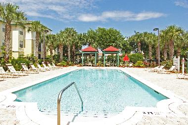Second solar heated pool at Legacy Dunes with sunbathing and shaded areas