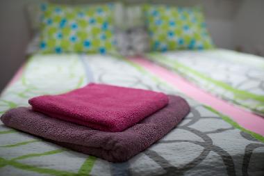 We provide two towels per person per stay - usually midi size towels