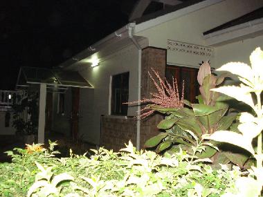 Viewing the outside of one of the rooms at night.