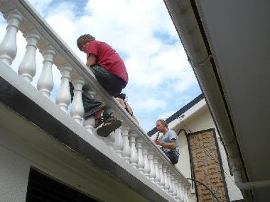 Guests playing music and relaxing at one of the two balconies.