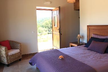 Master bedroom with deck access