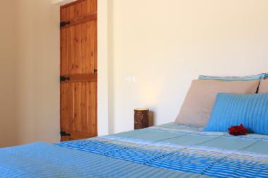 The blue bedroom with comfortable double bed