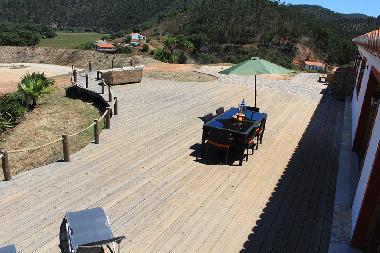 Overview of the deck with outside dining table