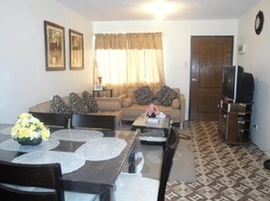Living and Dining Room with large Screen Tv