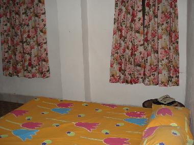 Double bed in bedroom