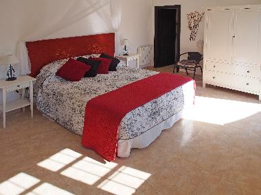 Almond suite bedroom with king size bed