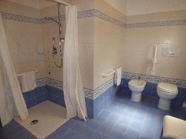 The extra large bathroom is also accessible for disabled.