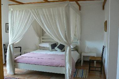 A romantic canopybed to make your stay something special!