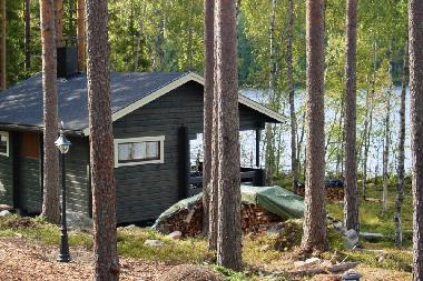 Lakeside sauna has a wood-burning stove and a big terrace.