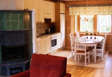 Fireplace and kitchen wiewed from the living room