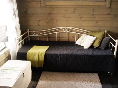 Lakeside sauna has a romantic sleeping room for two