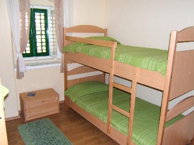 4 bed room (2 bunk beds) with private bathroom.
