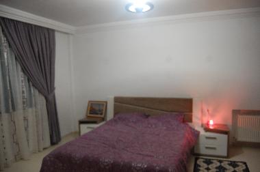 double bedroom with direct access to a bathroom with bathtub