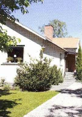 The entrance to the house with lots of space for parking
