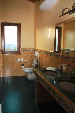 Ensuite Bathroom with bath thube - shower, WC and double sink