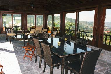 Pool lounge with eating table and barbecue