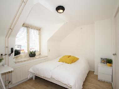 master bedroom with sight on the sea