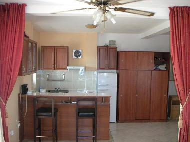 Open plan kichen with bar table