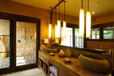 Bathrooms are equipped with toiletries and linen