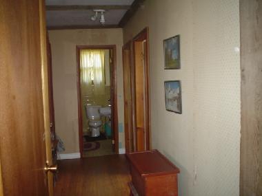 Hall leading to bedrooms and bathroom