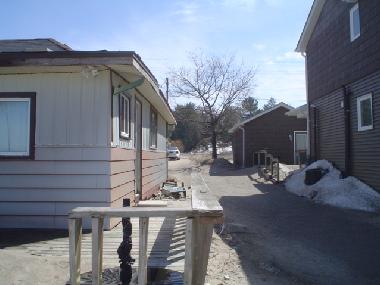 View from beach side towards the road, lots of parking