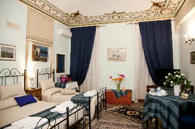 blu room with 4 beds