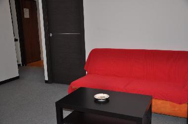 living room with the kitchen