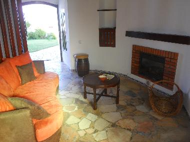 Cosy lounge with woodburner for the cooler months.