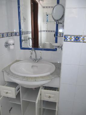 Ensuite bathroom with shower.