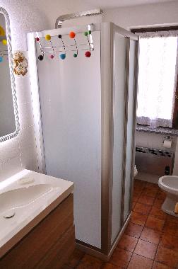 bathroom with shower and the window toward the private garden