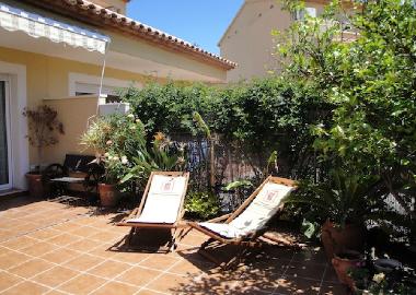 private garden and lounge chairs