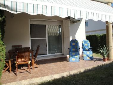terrace with awning and garden mobiliary
