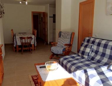 dining and living room with double sofabed