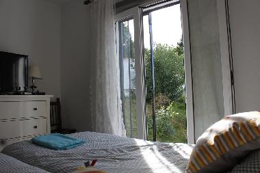 One of the two bedrooms downstairs.