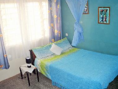 Cocnut bay apartment : room "Orange-blue"