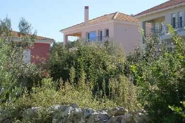 all three, the red, the pink and the green villa