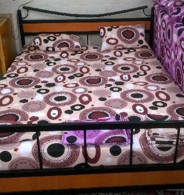 Clean bed with three extra mattress 