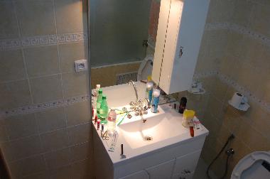 bathroom with shower and jacuzzi