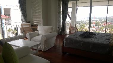 bedroom and lounge area