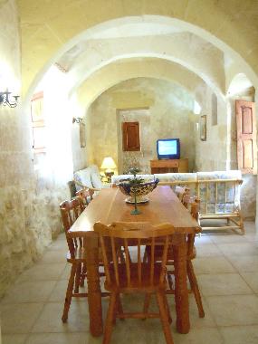 BALLUTA holiday house dining area with sofa across this room