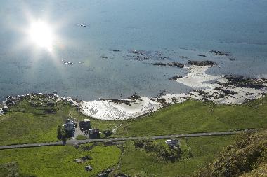 The house is placed by the sea in the middle of the Lofoten islands.