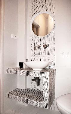 Bathroom with shower and washing machine