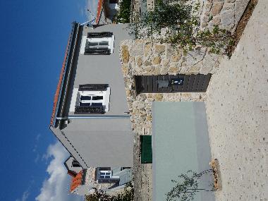 Holiday House in Jezera (Sibensko-Kninska) or holiday homes and vacation rentals
