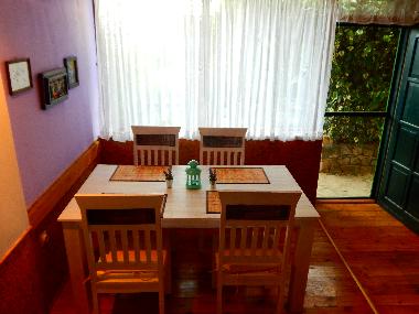 Part of dinning room and garden exit