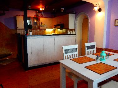 Part of dinning room and kitchen