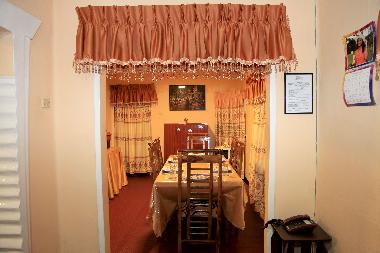 Looking back from the sitting area into the dining room