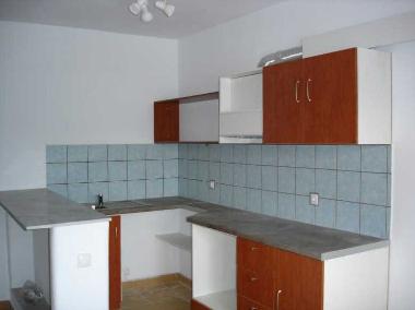 part view into the kitchen. Left hand the small bar.