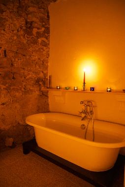 Bathroom in the cave, bath tub and WC