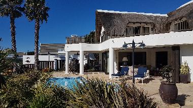 Undercover patio overlooking pool