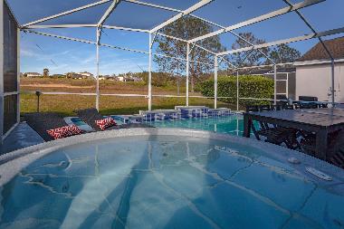 Poolside patio with BBQ grill & seating for 28
